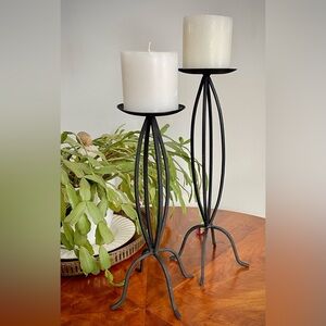 PAIR OF BLACK METAL CANDLE STICKS WITH 3” PILLAR CANDLES INCLUDED
